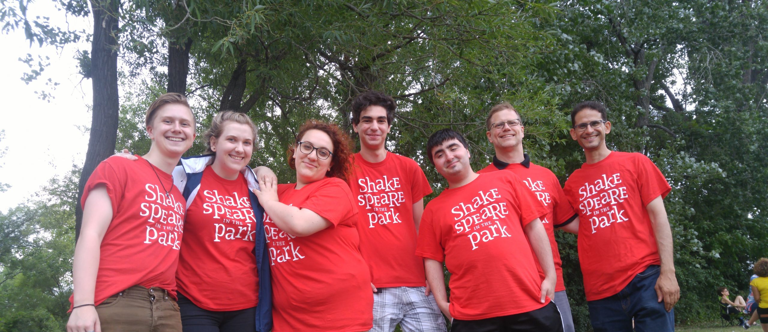 8 volunteers with the red repercussion theatre tshirts from 2018